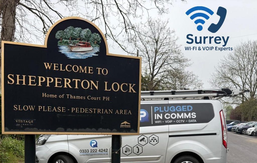 van parked near the Shepperton town sign in Surrey, performing VoIP and broadband connection checks for local customers.