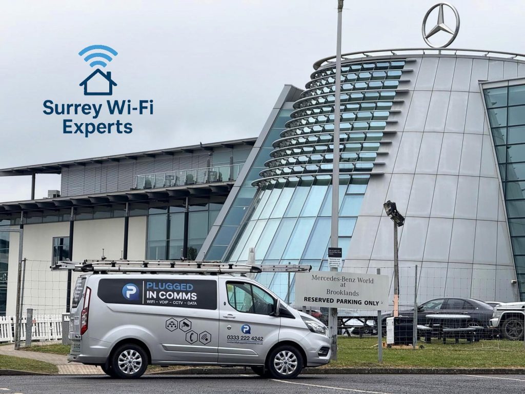 Surrey Wi-Fi & VoIP Experts van parked outside Mercedes-Benz World in Weybridge, Surrey, during a Wi-Fi, VoIP, and 4G/5G broadband installation.