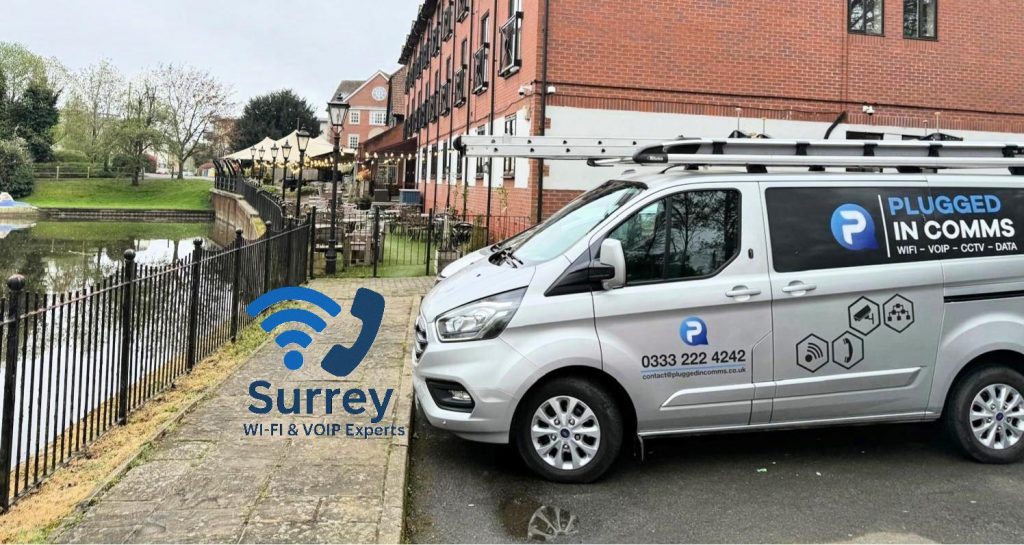 van parked outside a riverside pub in Chertsey, near the River Thames, providing Wi-Fi and VoIP installation for local businesses.