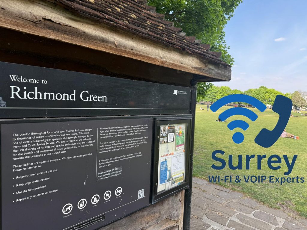 View of Richmond Green with residential buildings in the background, highlighting local support for Optical Network Terminal ONTs and fibre broadband services.